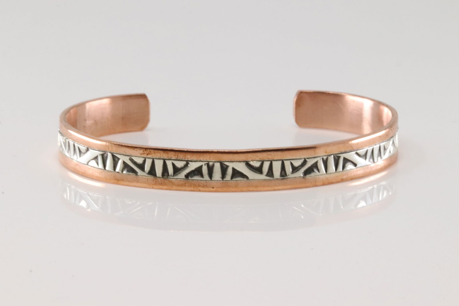 Native America Navajo Sterling Silver Copper Bracelet Cuff By Wylie Secatero.: This is a Native America Navajo Sterling Silver Copper Bracelet Cuff By Wylie Secatero.
