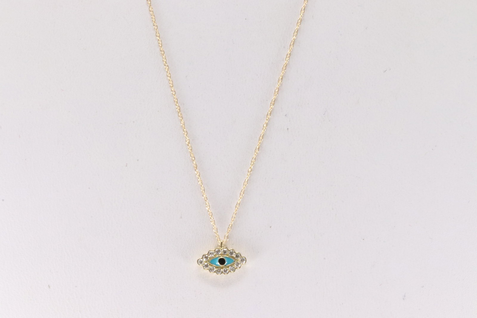 Diamond & Multi-Stone Evil Eye Pendant / Necklace 14K.: 14Kt Yellow Gold Diamond & Multi-Stone Evil Eye Pendant / Necklace. This pendant has evil eye design with 15 round diamonds / multi-stone and a 14k Necklace. Diamonds weight approx: 0.10ctw. Necklace 