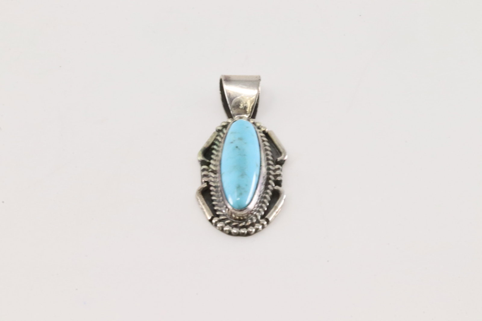 Native America Navajo Sterling Silver Turquoise Pendant By Jan Mariano.: This is a Native America Navajo Sterling Silver Turquoise Pendant By Jan Mariano.