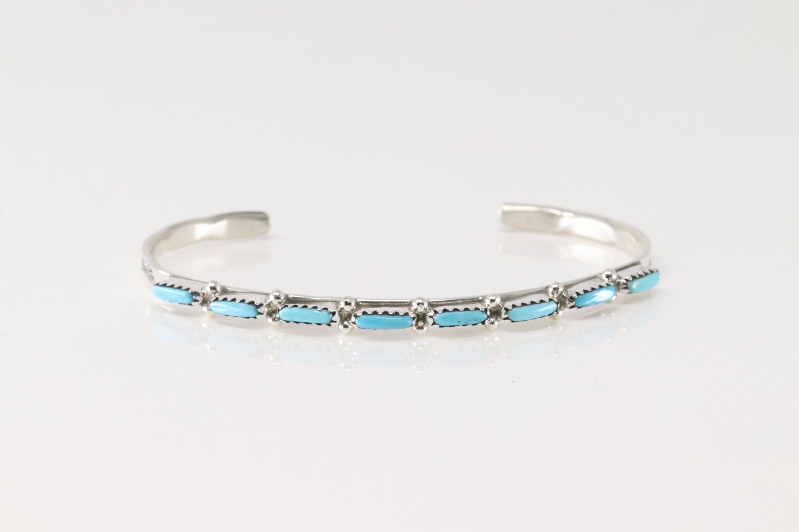 Native America Zuni Sterling Silver Turquoise Bracelet Cuff By Murray Hannaweeka.: This is a Native America Zuni Sterling Silver Turquoise Bracelet Cuff By Murray Hannaweeka.