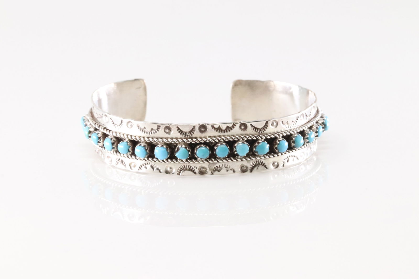 Native America Zuni Sterling Silver Turquoise Bracelet Cuff By Pearl Ukestine.: This is a Native America Zuni Sterling Silver Turquoise Bracelet Cuff By Pearl Ukestine.