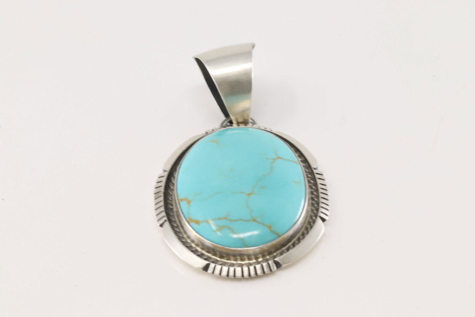 Native America Navajo Sterling Silver Kingman Turquoise Pendant By Alfred Martinez.: This is a Native America Navajo Sterling Silver Kingman Turquoise Pendant By Alfred Martinez.