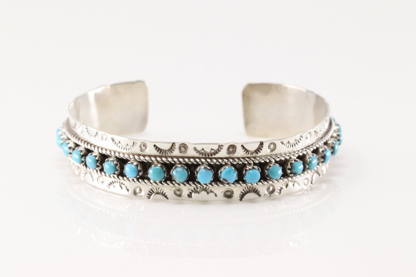 Native America Zuni Sterling Silver Turquoise Bracelet Cuff By Pearl Ukestine.: This is a Native America Zuni Sterling Silver Turquoise Bracelet Cuff By Pearl Ukestine.