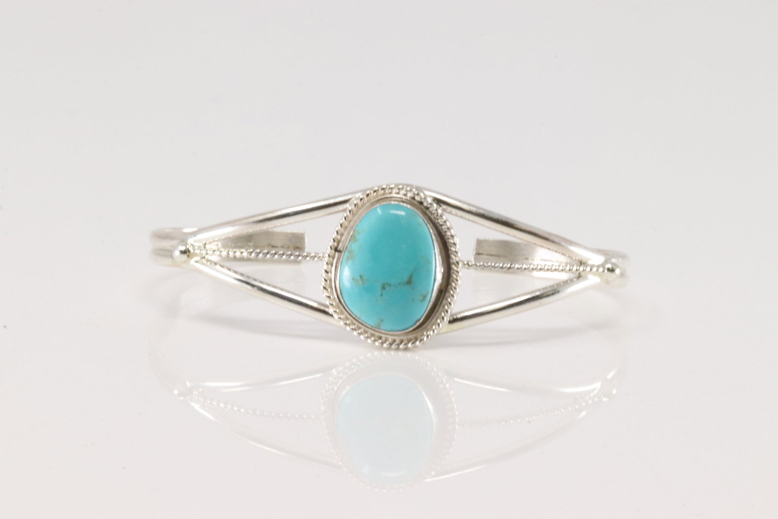 Native America Navajo Sterling Silver Turquoise Bracelet Cuff By P.Skeets.: This is a Native America Navajo Sterling Silver Turquoise Bracelet Cuff By P.Skeets.