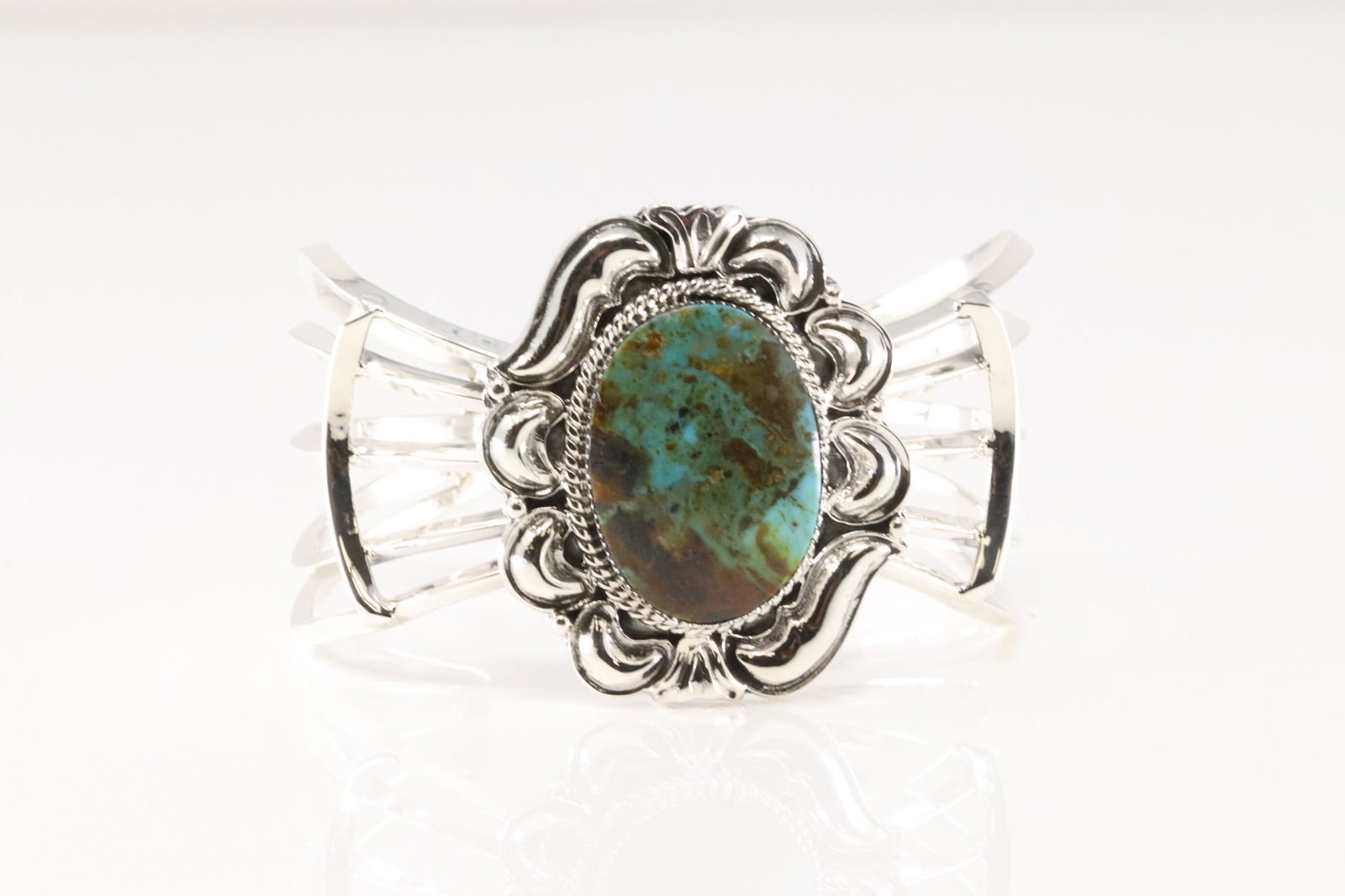 Native American Navajo Sterling Silver Turquoise Bracelet Cuff By Irvin Tsosie.: This is a Native American Navajo Sterling Silver Turquoise Bracelet Cuff By Irvin Tsosie.