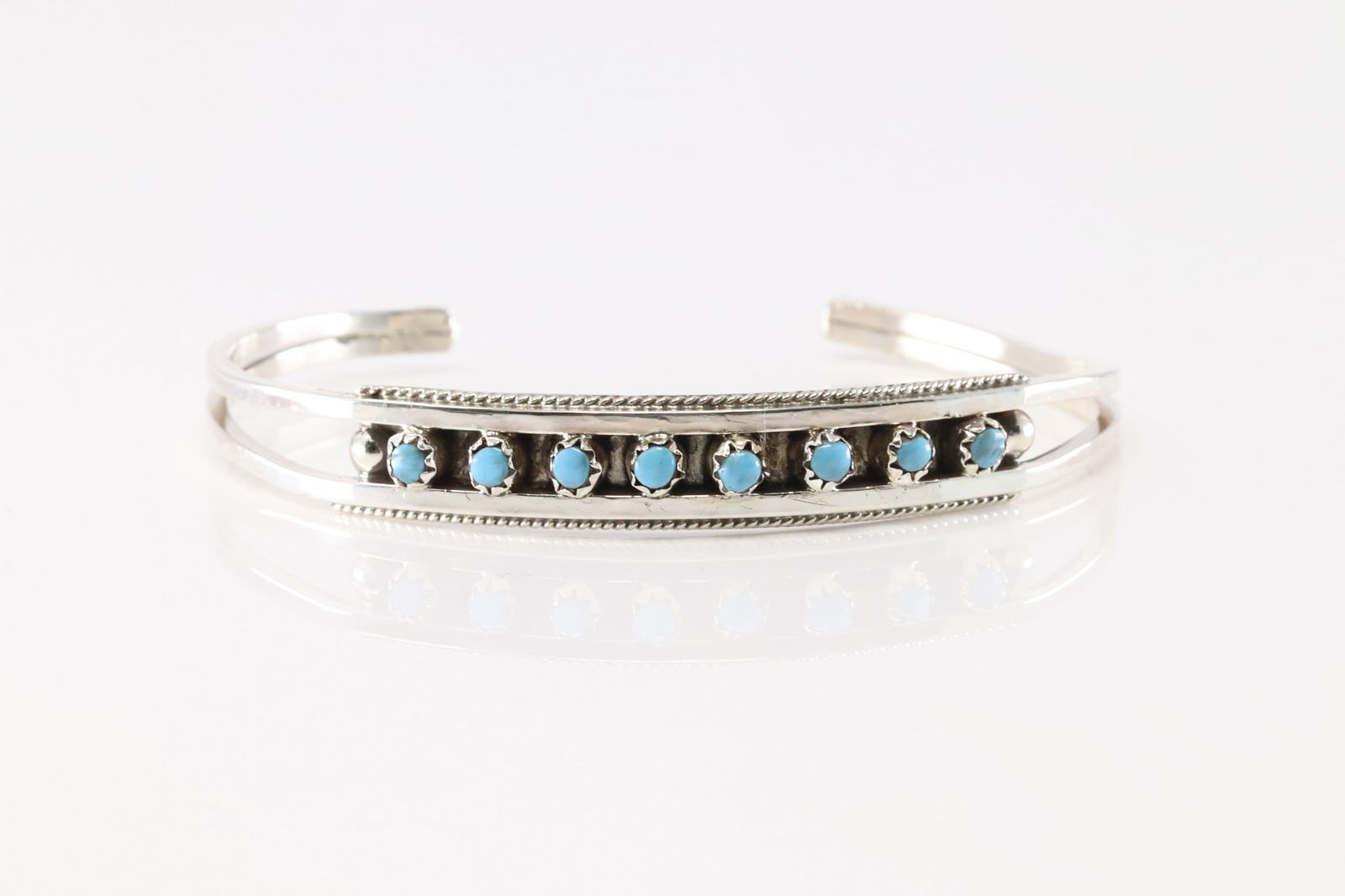Native America Zuni Sterling Silver Turquoise Bracelet Cuff By Susie Livingston.: This is a Native America Zuni Sterling Silver Turquoise Bracelet Cuff By Susie Livingston.