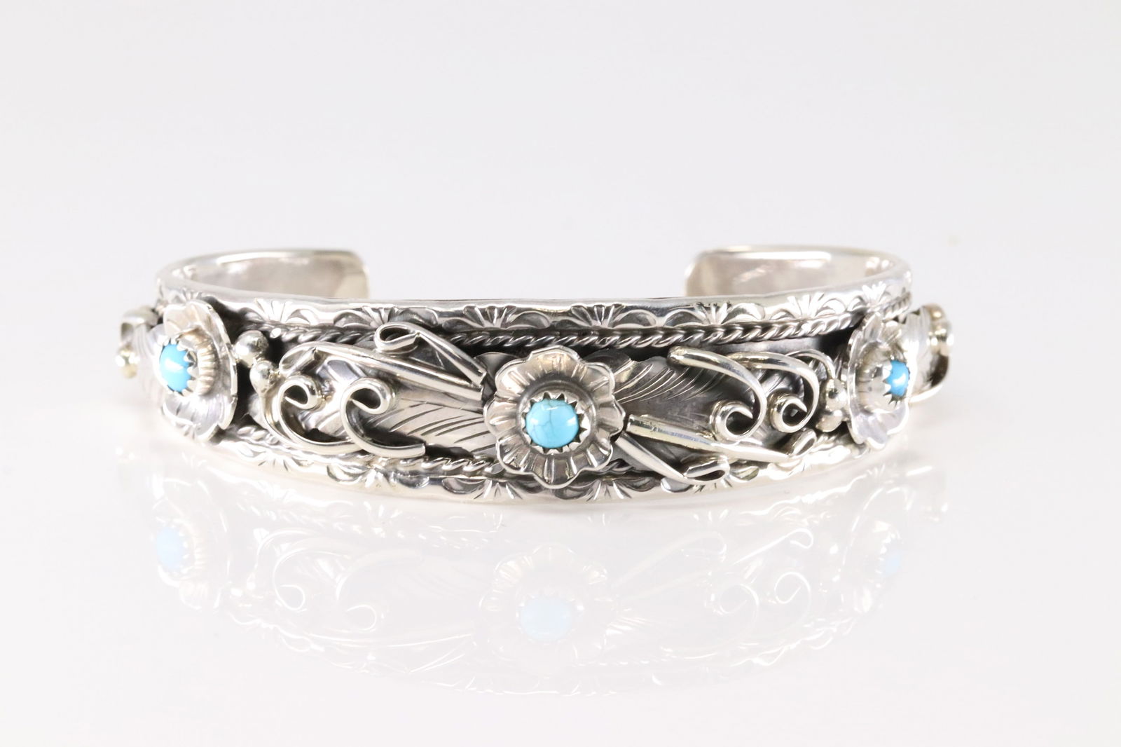 Native America Navajo Sterling Silver Turquoise Bracelet Floral Cuff By Bessie Joe.: This is a Native America Navajo Sterling Silver Turquoise Bracelet Floral Cuff By Bessie Joe.