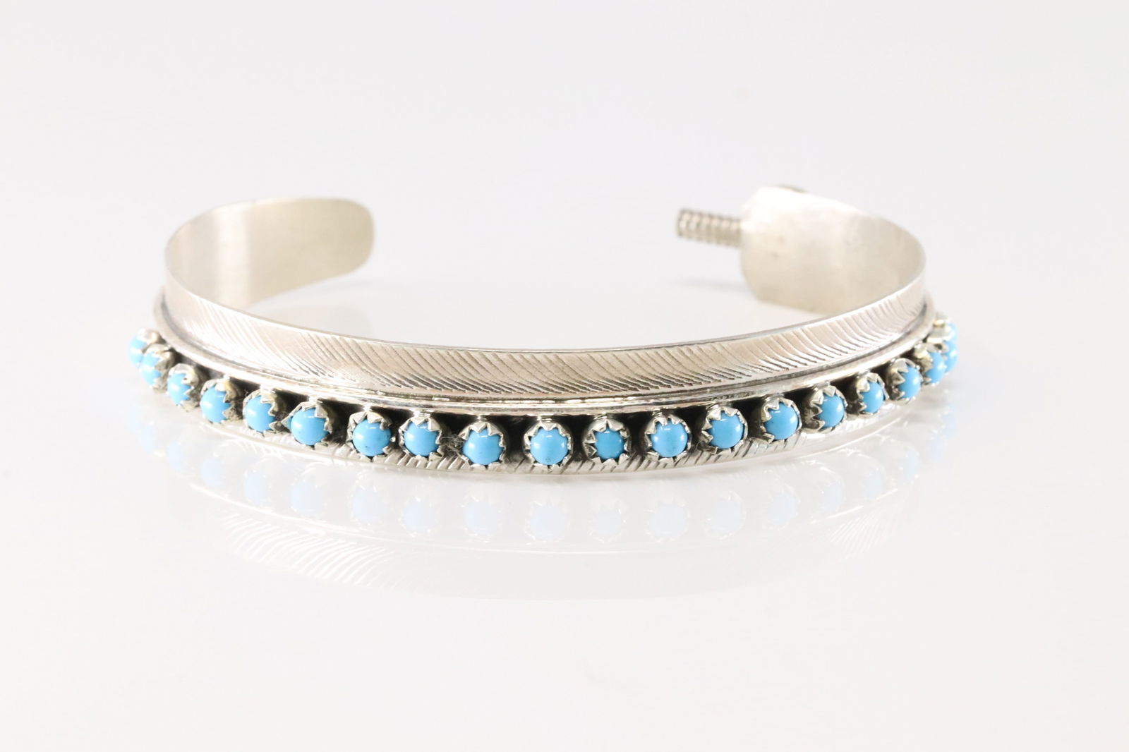 Native America Navajo Sterling Silver Turquoise Feather Bracelet Cuff By A.D.: This is a Native America Navajo Sterling Silver Turquoise Feather Bracelet Cuff By A.D.