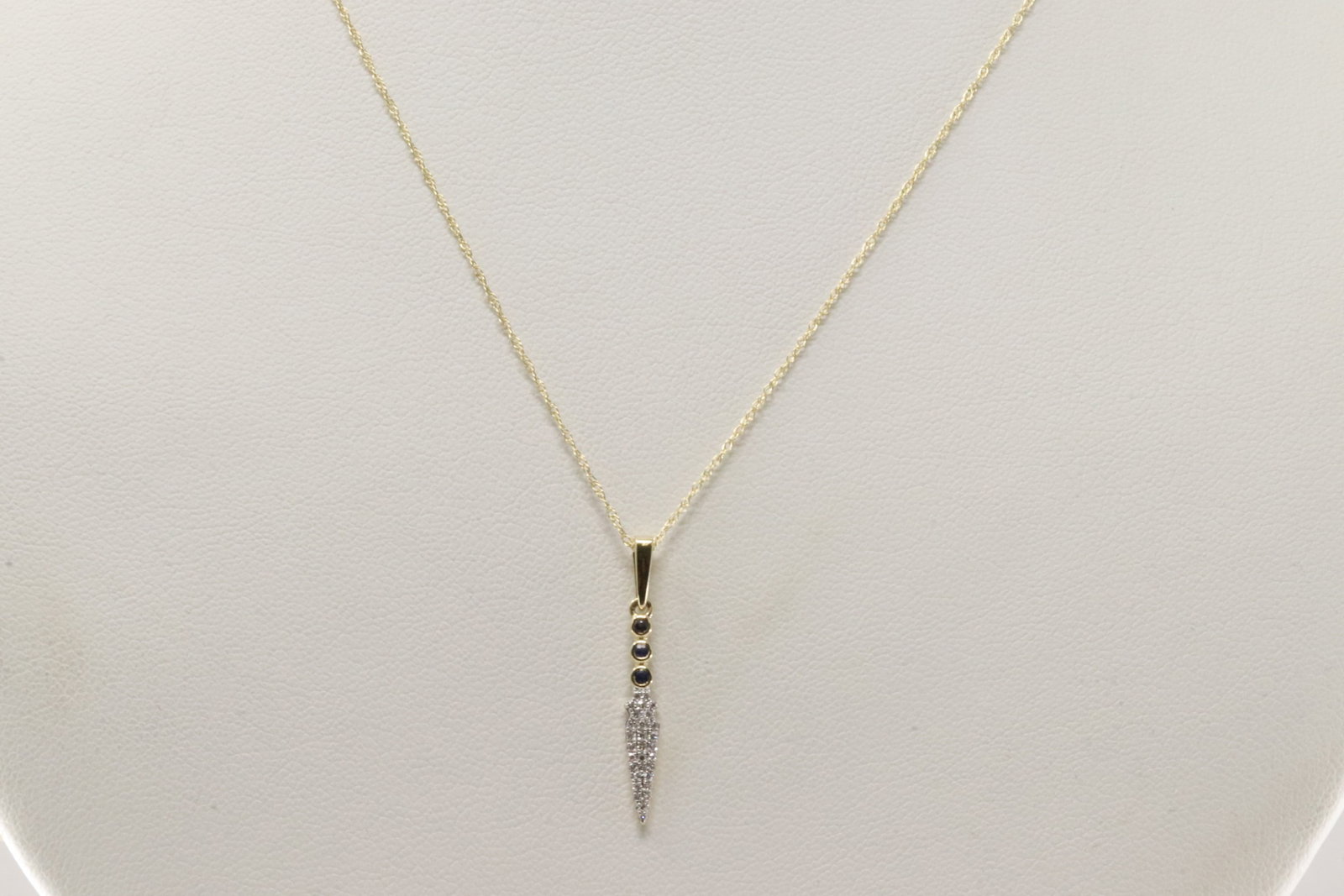 Sapphire & Diamond Pendant / Necklace 10Kt.: 10Kt Yellow Gold Sapphire & Diamond Pendant / Necklace. Necklace has a pendant with Blue Sapphires and round Diamonds. Diamodns weight: 0.1ctw. Necklace length: 20.00"