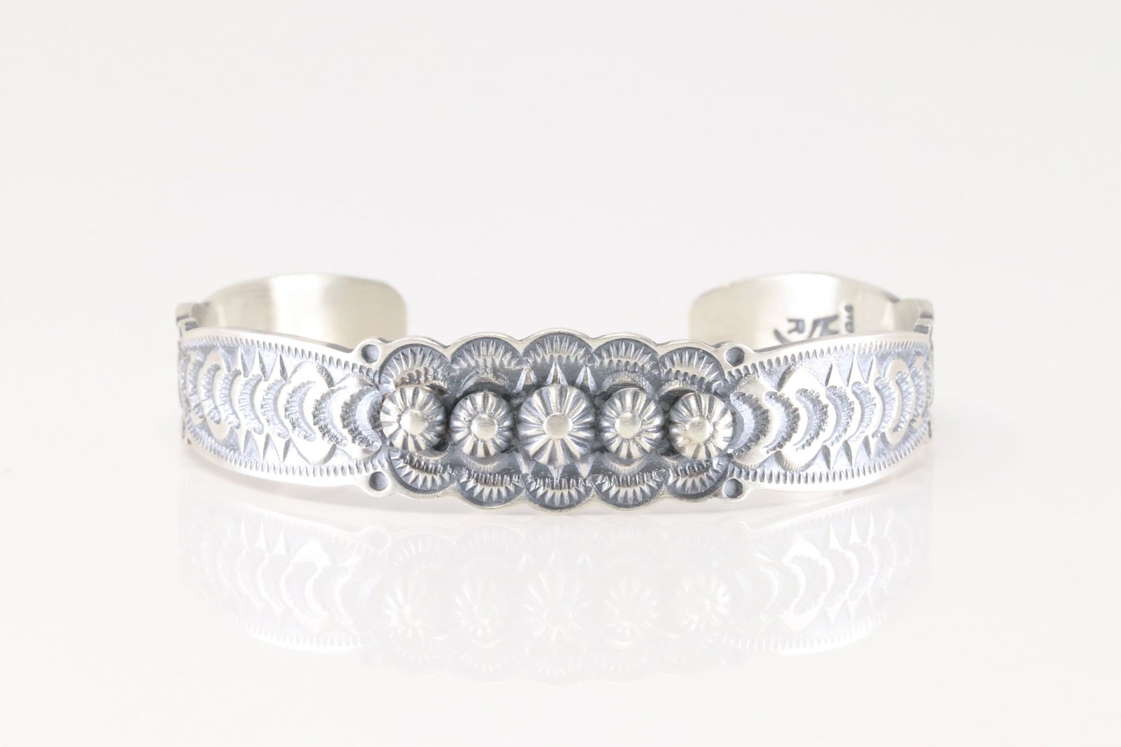 Native America Navajo Sterling Silver Solid Stamped Bracelet Cuff By Bennie Ramone.: This is a Native America Navajo Sterling Silver Solid Stamped Bracelet Cuff By Bennie Ramone.
