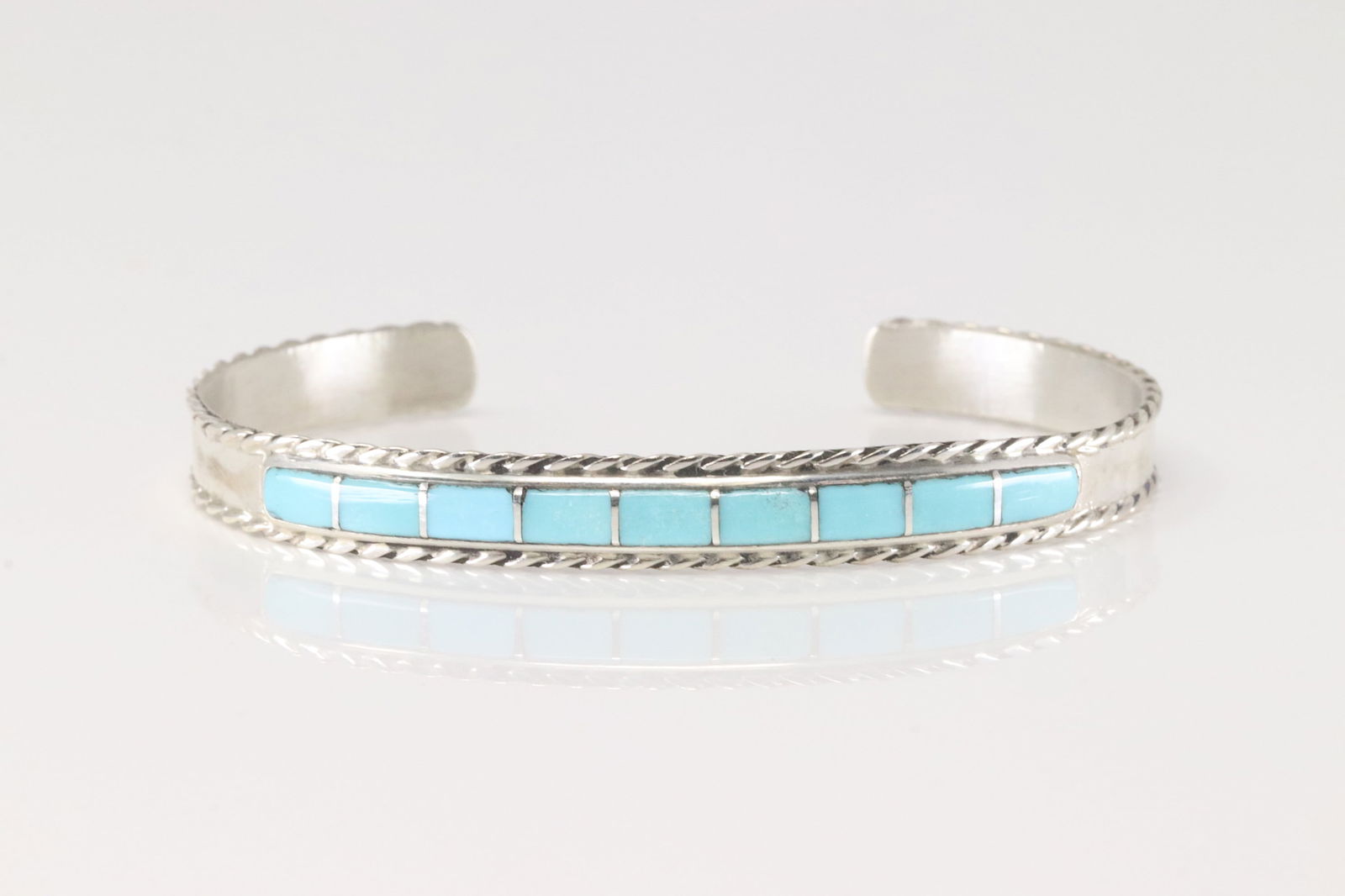 Native America Navajo Sterling Silver Turquoise Inlay Bracelet Cuff By J.P.: This is a Native America Navajo Sterling Silver Turquoise Inlay Bracelet Cuff By J.P.