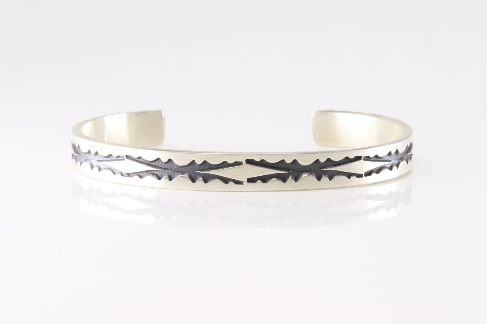 Native America Navajo Sterling Silver Stamped Solid Bracelet Cuff By Jerrold Tahe.: This is a Native America Navajo Sterling Silver Stamped Solid Bracelet Cuff By Jerrold Tahe.