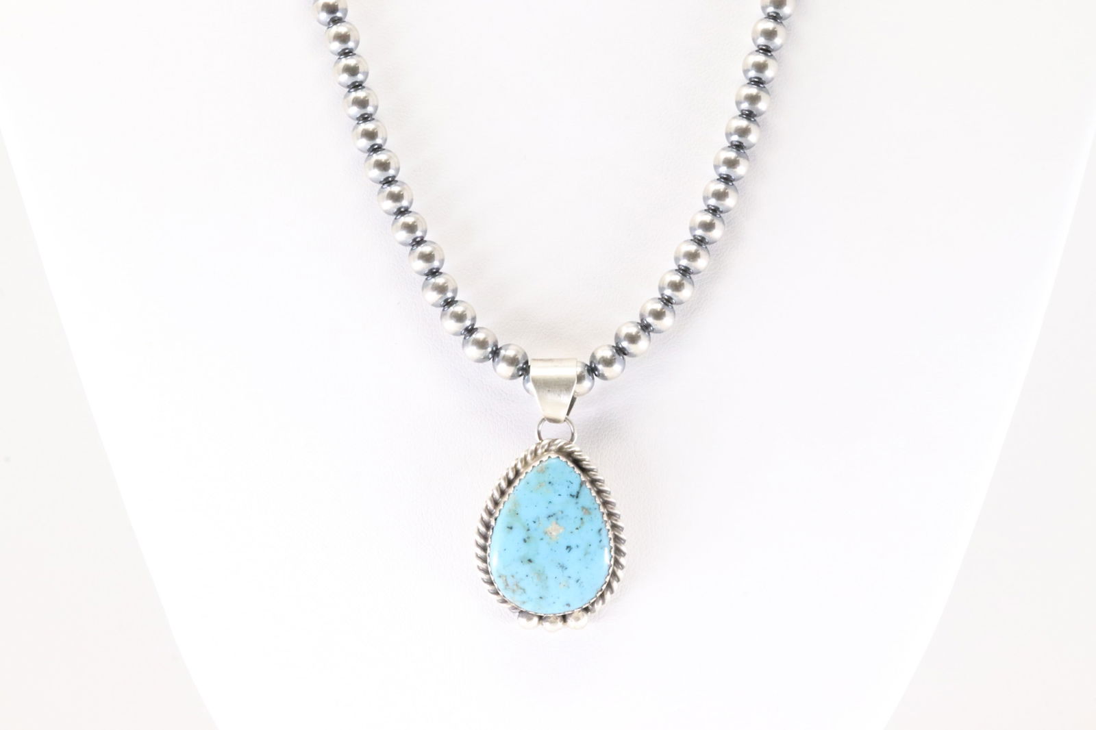 Native America Navajo Sterling Silver Kingman Turquoise Pendant By Freda Martinez. With Pearl Beaded: This is a Native America Navajo Sterling Silver Kingman Turquoise Pendant By Freda Martinez. With Pearl Beaded Sterling Silver Machine Made Necklace. Necklace length: 18.00"