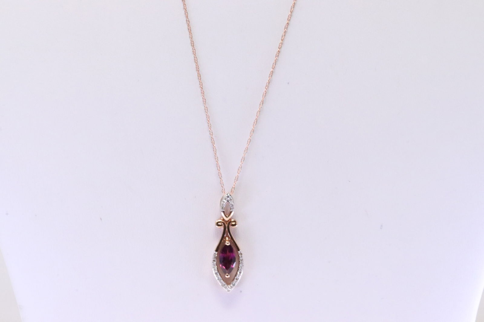 Rhodolite & Diamond Pendant / Necklace 10Kt.: Ladies 10Kt Rose Gold Rhodolite & Diamond Pendant / Necklace. Necklace has Pendant with Rhodolite Gemstone with round Diamonds. Diamonds weight: 0.10ctw. Necklace length: 18.00"
