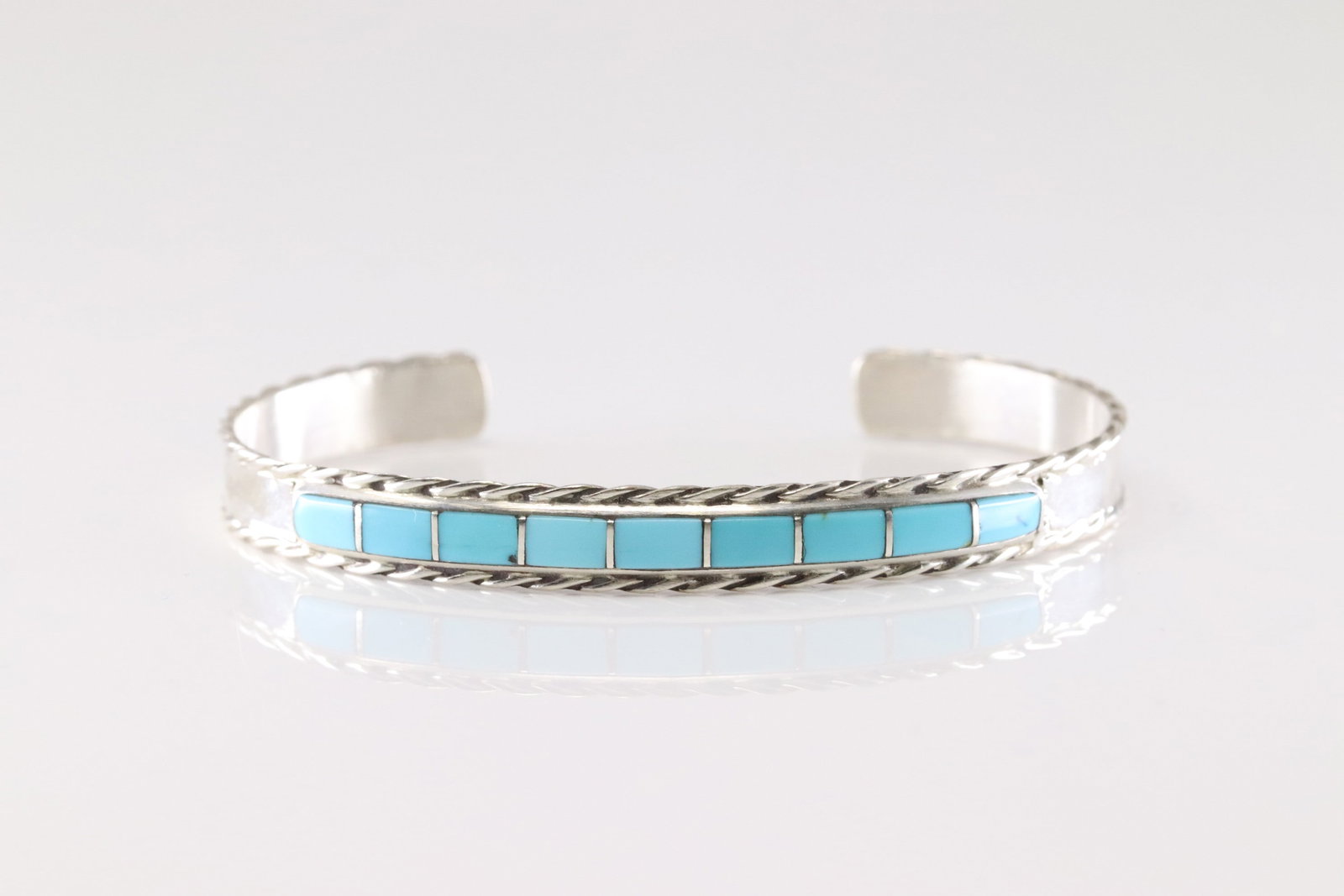 Native America Navajo Sterling Silver Turquoise Inlay Bracelet Cuff By J.P.: This is a Native America Navajo Sterling Silver Turquoise Inlay Bracelet Cuff By J.P.