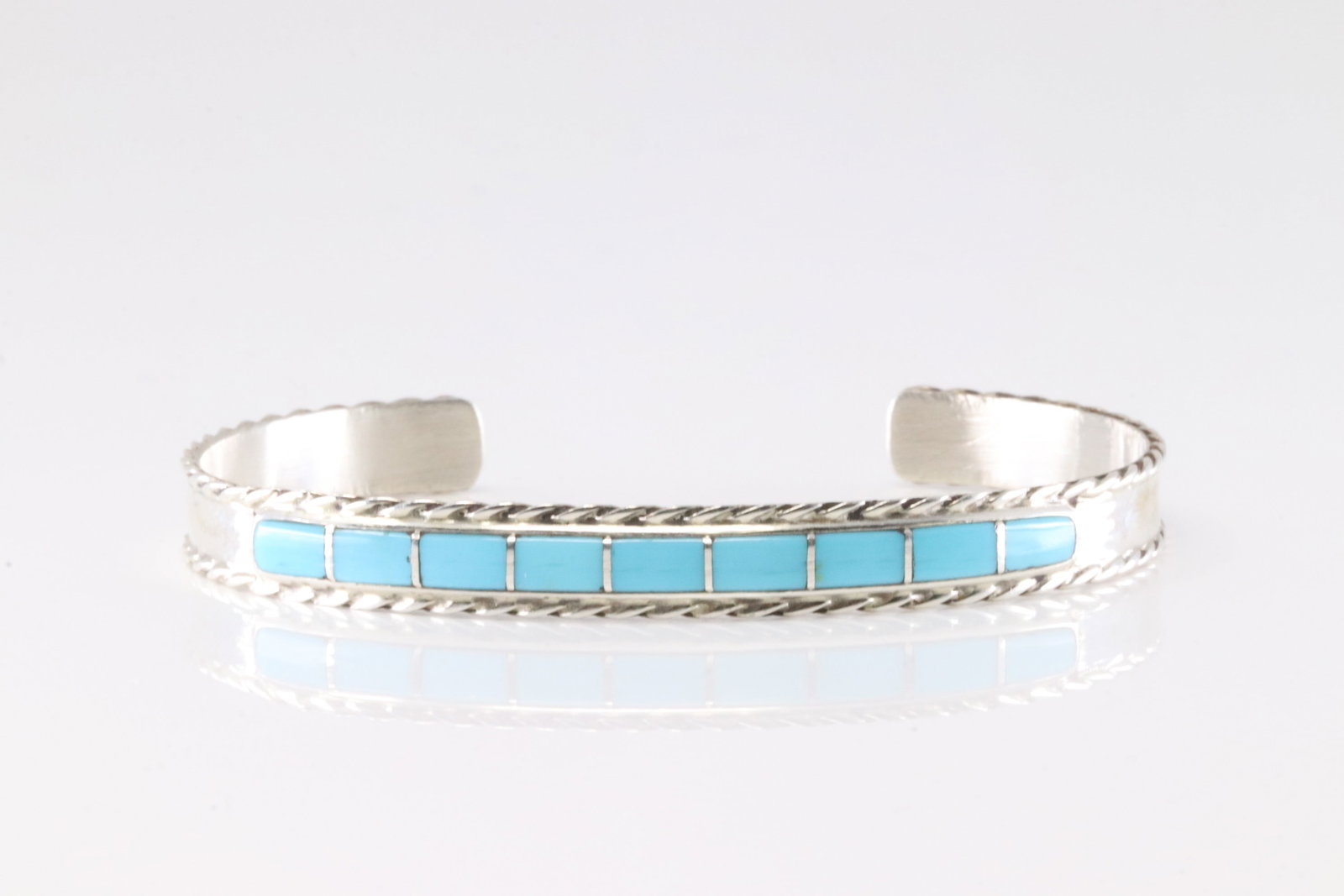 Native America Navajo Sterling Silver Turquoise Inlay Bracelet Cuff By J.P.: This is a Native America Navajo Sterling Silver Turquoise Inlay Bracelet Cuff By J.P.