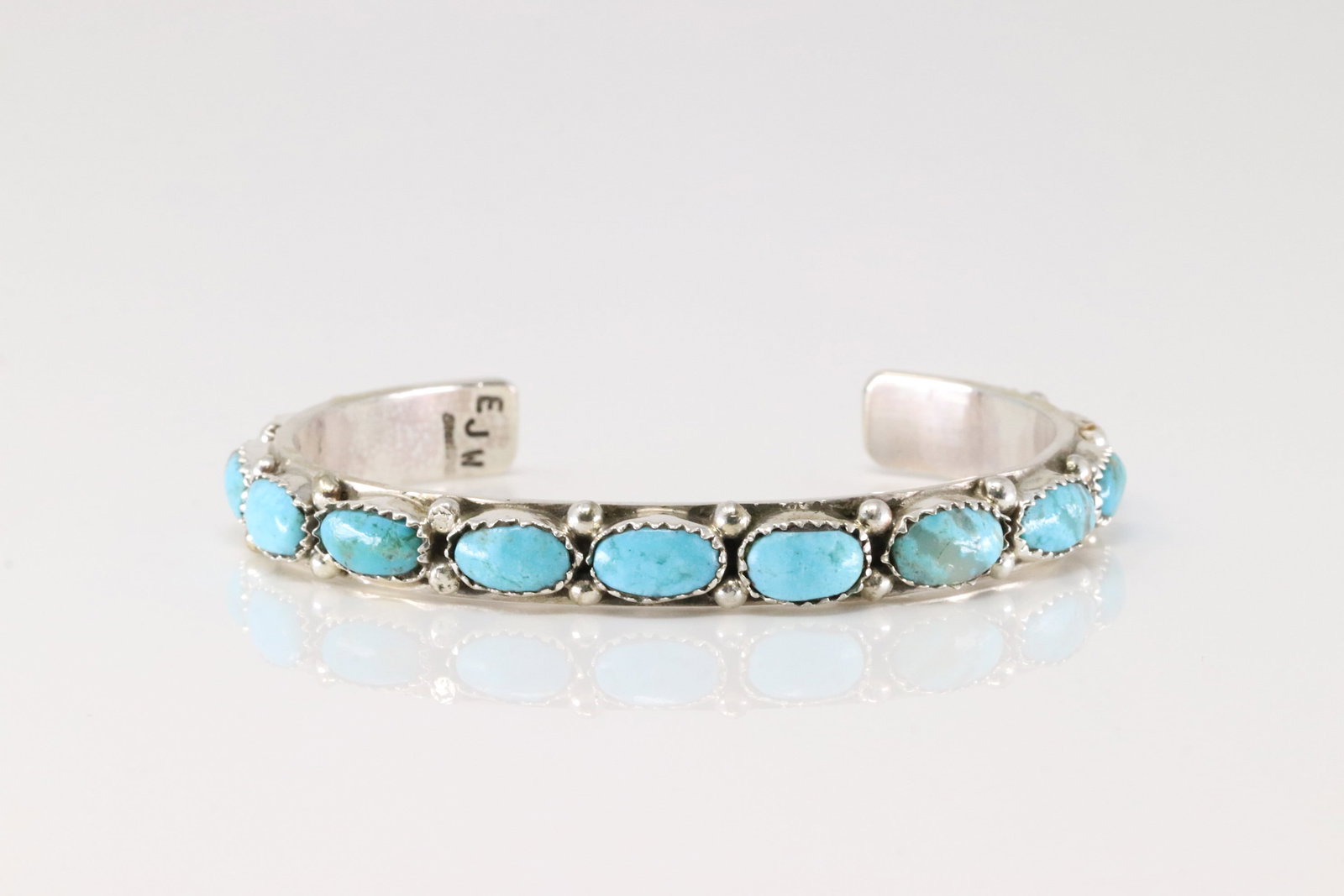 Native American Navajo Sterling Silver Turquoise Bracelet Cuff By E.J.W.: This is a Native American Navajo Sterling Silver Turquoise Bracelet Cuff By E.J.W.
