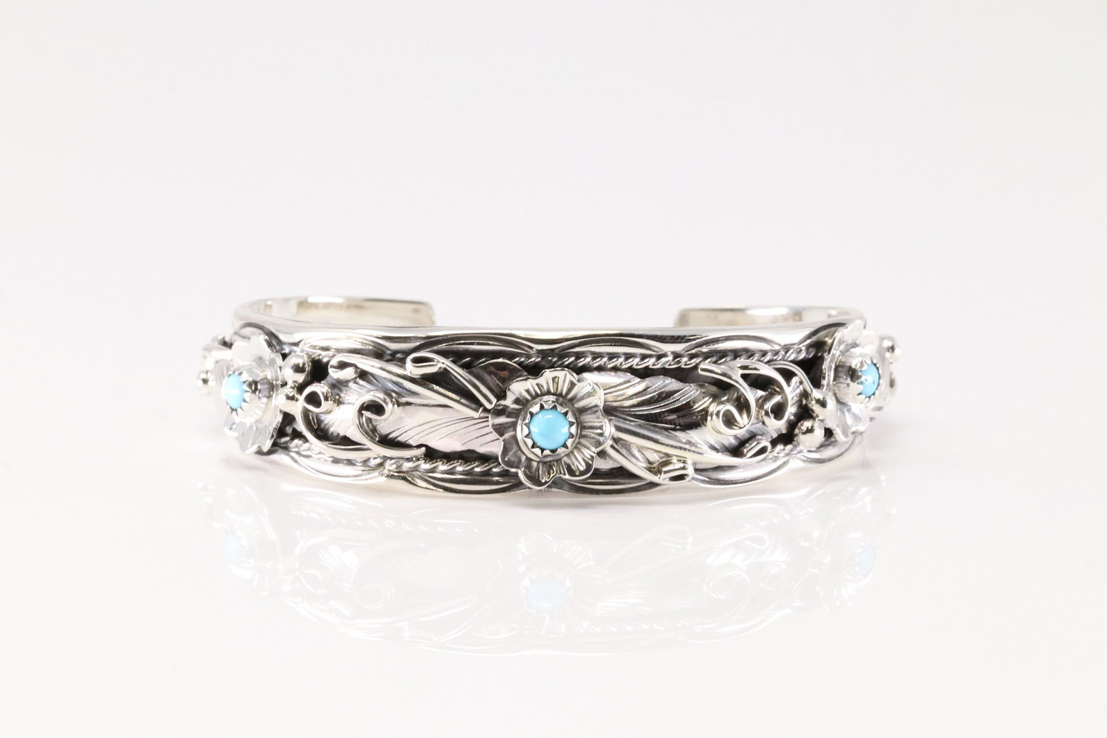 Native America Navajo Sterling Silver Turquoise Bracelet Floral Cuff By Bessie Joe.: This is a Native America Navajo Sterling Silver Turquoise Bracelet Floral Cuff By Bessie Joe.
