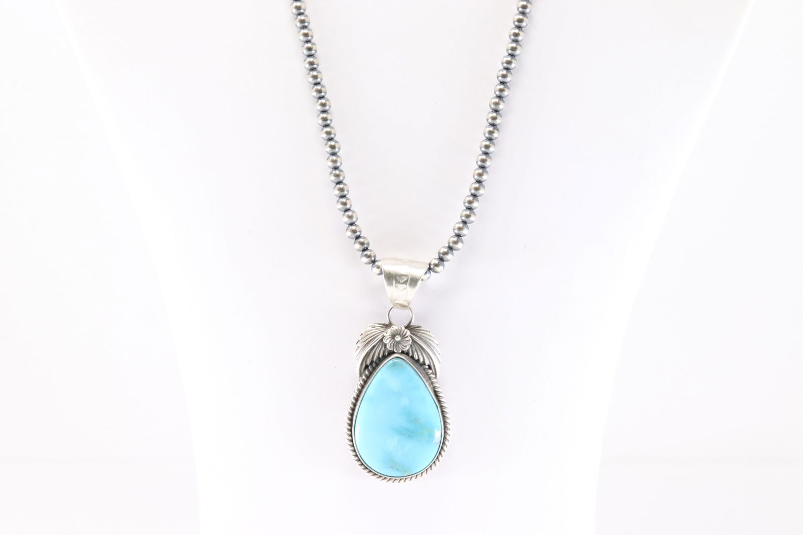 Native America Navajo Sterling Silver Kingman Turquoise Pendant By Jimson Belin. With Pearl Beaded: This is a Native America Navajo Sterling Silver Kingman Turquoise Pendant By Jimson Belin. With Pearl Beaded Sterling Silver Machine Made Necklace. Necklace length: 20.00"