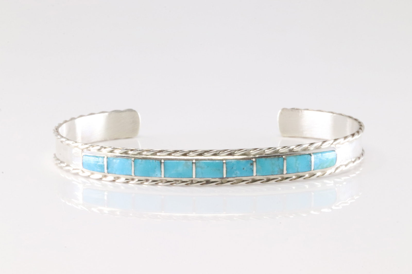 Native America Navajo Sterling Silver Turquoise Inlay Bracelet Cuff By J.P.: This is a Native America Navajo Sterling Silver Turquoise Inlay Bracelet Cuff By J.P.