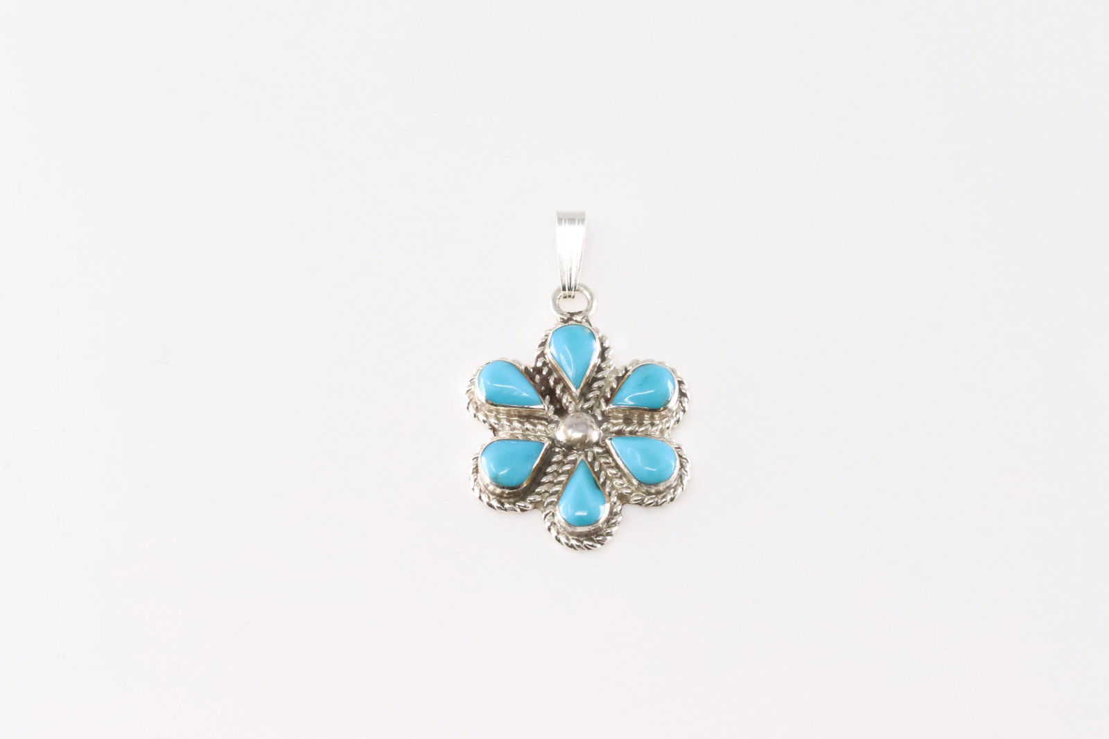 Native America Zuni Sterling Silver Turquoise Pendant By Gina Docedo.: This is a Native America Zuni Sterling Silver Turquoise Pendant By Gina Docedo.