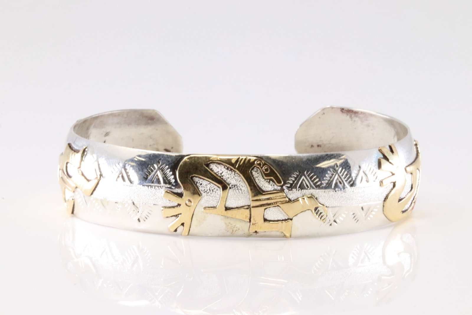 Native America Navajo Sterling Silver Stamped Kokopelli Bracelet Cuff By G.J.: This is a Native America Navajo Sterling Silver Stamped Kokopelli Bracelet Cuff By G.J.