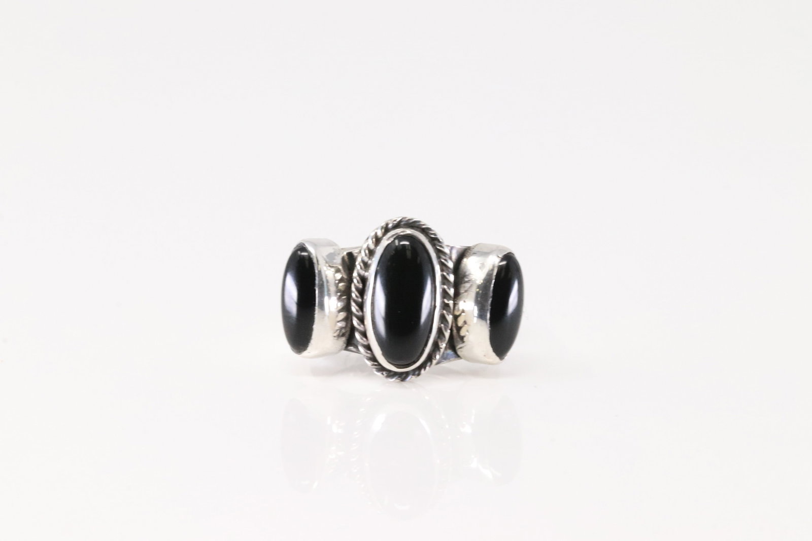 Native America Navajo Sterling Silver Black Onyx Ring By Andrew Enrico.: This is a Native America Navajo Sterling Silver Black Onyx Ring By Andrew Enrico. Ring size: 5.50.