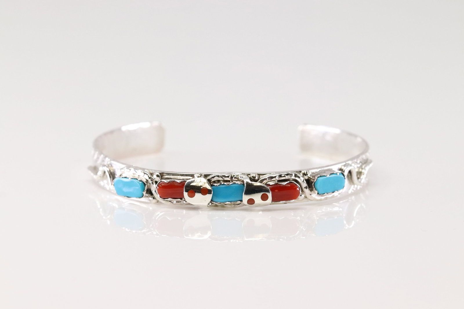 Native America Zuni Sterling Silver Coral & Turquoise Bracelet Cuff By Joy Calabaza.: This is a Native America Zuni Sterling Silver Coral & Turquoise Bracelet Cuff By Joy Calabaza.