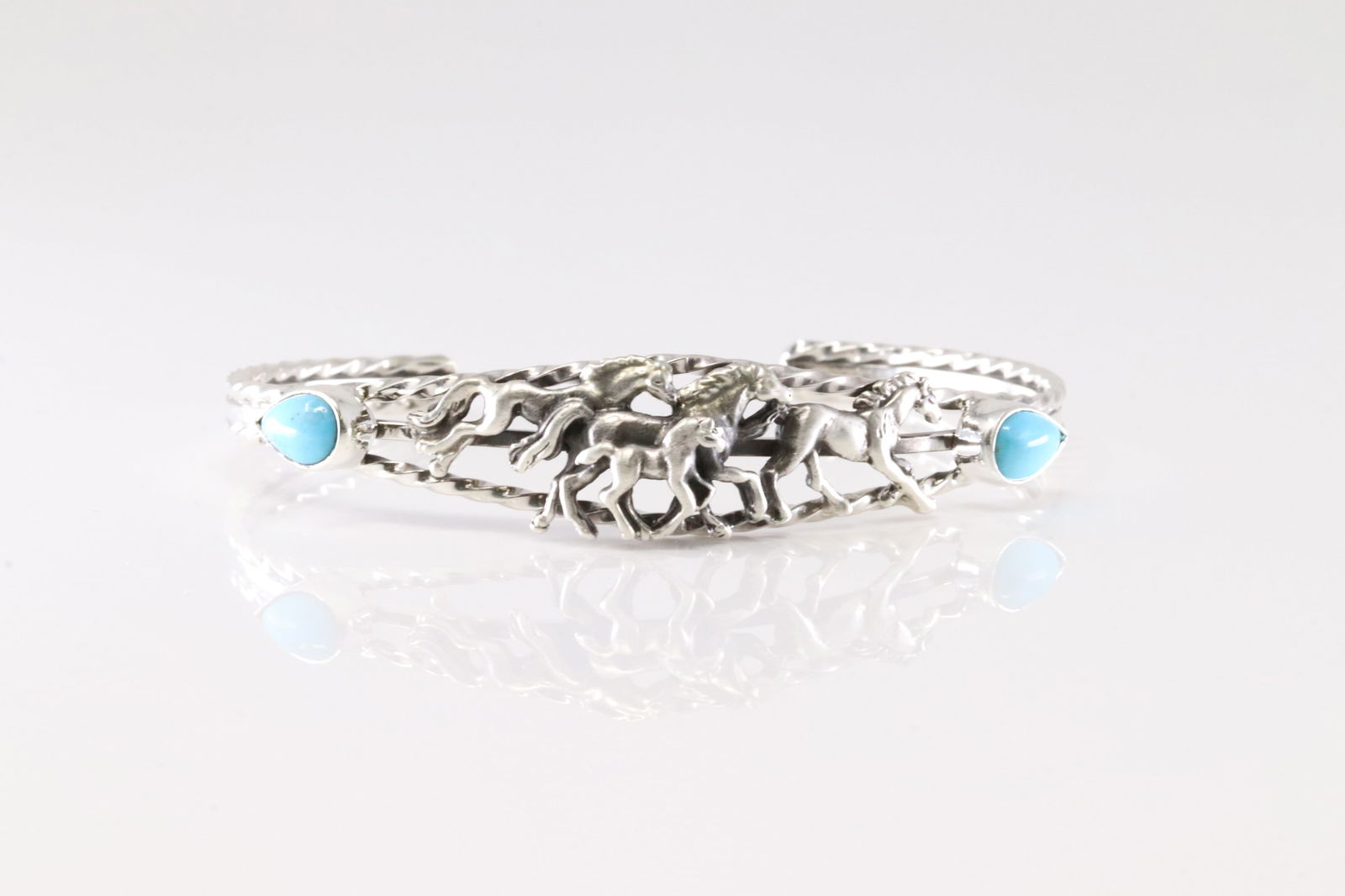 Native America Navajo Sterling Silver Turquoise Horse Bracelet Cuff By Bobby Platero.: This is a Native America Navajo Sterling Silver Turquoise Horse Bracelet Cuff By Bobby Platero.