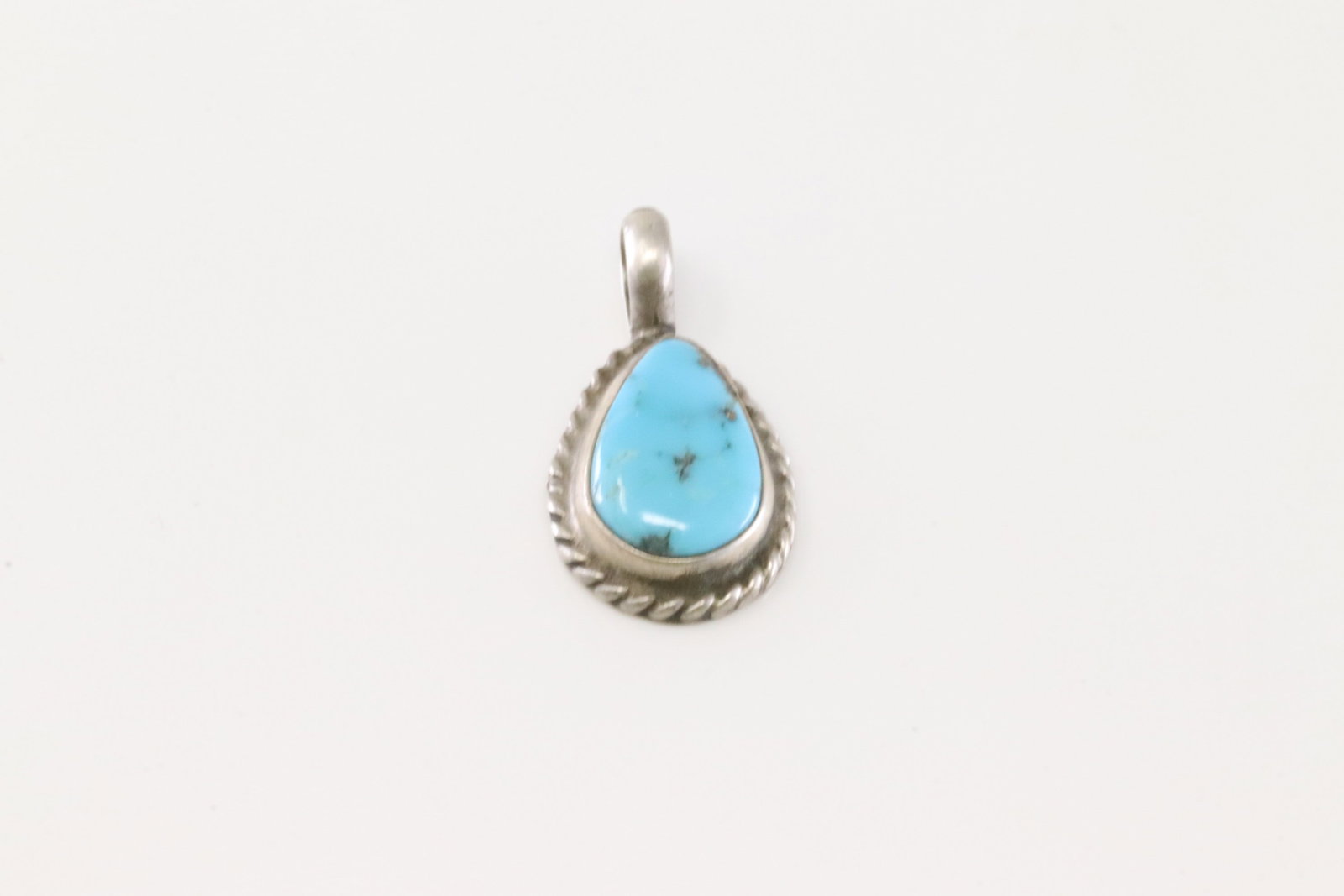 Native America Navajo Sterling Silver Turquoise Pendant By Geraldine James.: This is a Native America Navajo Sterling Silver Turquoise Pendant By Geraldine James.