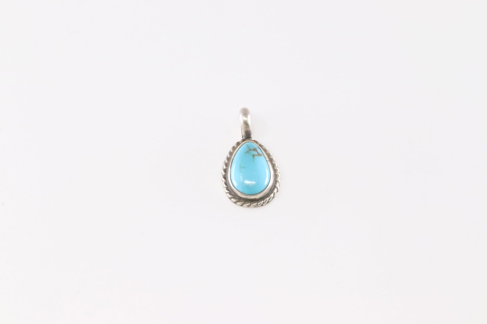 Native America Navajo Sterling Silver Turquoise Pendant By Geraldine James.: This is a Native America Navajo Sterling Silver Turquoise Pendant By Geraldine James.