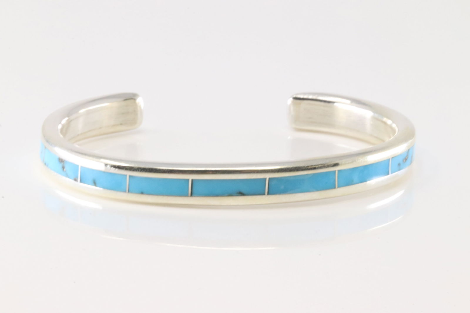 Native American Zuni Sterling Silver Kingman Turquoise Inlay Bracelet Cuff By Lawrence Lorret.: This is a Native American Zuni Sterling Silver Kingman Turquoise Inlay Bracelet Cuff By Lawrence Lorret.