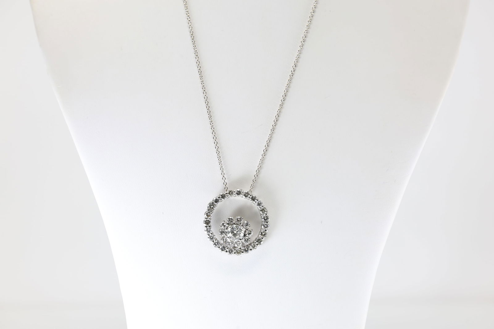 Diamond Pendent / Necklace 18Kt.: Ladies 18Kt White Gold Diamond Pendent / Necklace. This Necklace has Charming Pendent With 34 Round Briiliant Diamonds. Diamond Weight Approx: 5.00 ctw Necklace Lenght: 18.00. Total Weight: 13.12 Gram