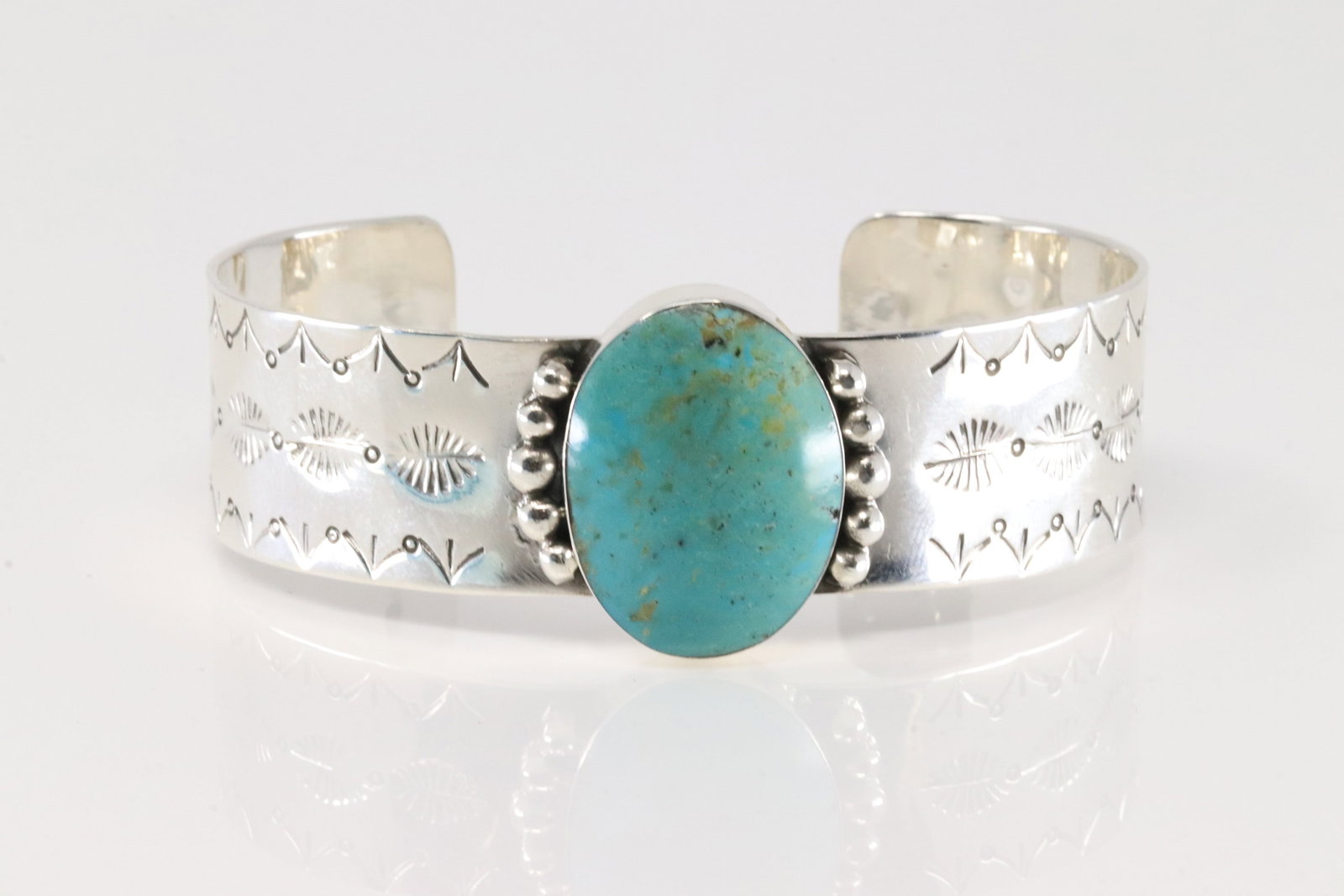 Native America Navajo Sterling Silver Turquoise Bracelet Cuff By Daniel Dakai.: This is a Native America Navajo Sterling Silver Turquoise Bracelet Cuff By Daniel Dakai. Stamp "D"
