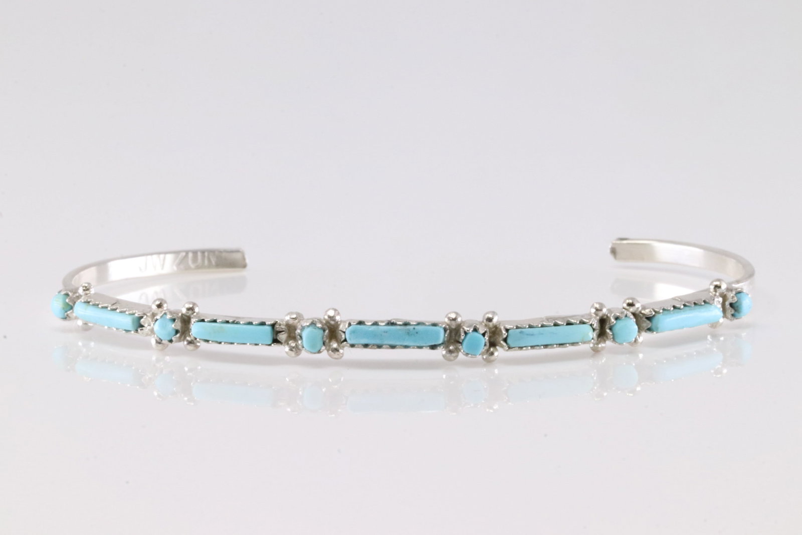 Native America Zuni Sterling Silver Turquoise Bracelet Cuff By J.W.: This is a Native America Zuni Sterling Silver Turquoise Bracelet Cuff By J.W.