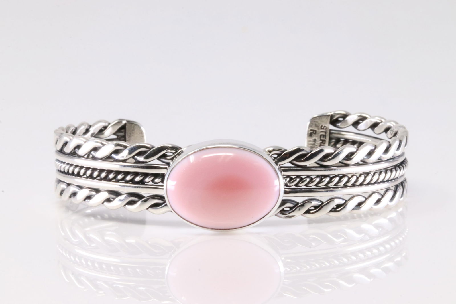 Native America Navajo Sterling Silver Pink Conch Shell Bracelet Cuff By Ray Tom.: This is a Native America Navajo Sterling Silver Pink Conch Shell Bracelet Cuff By Ray Tom. Stamp R.T.