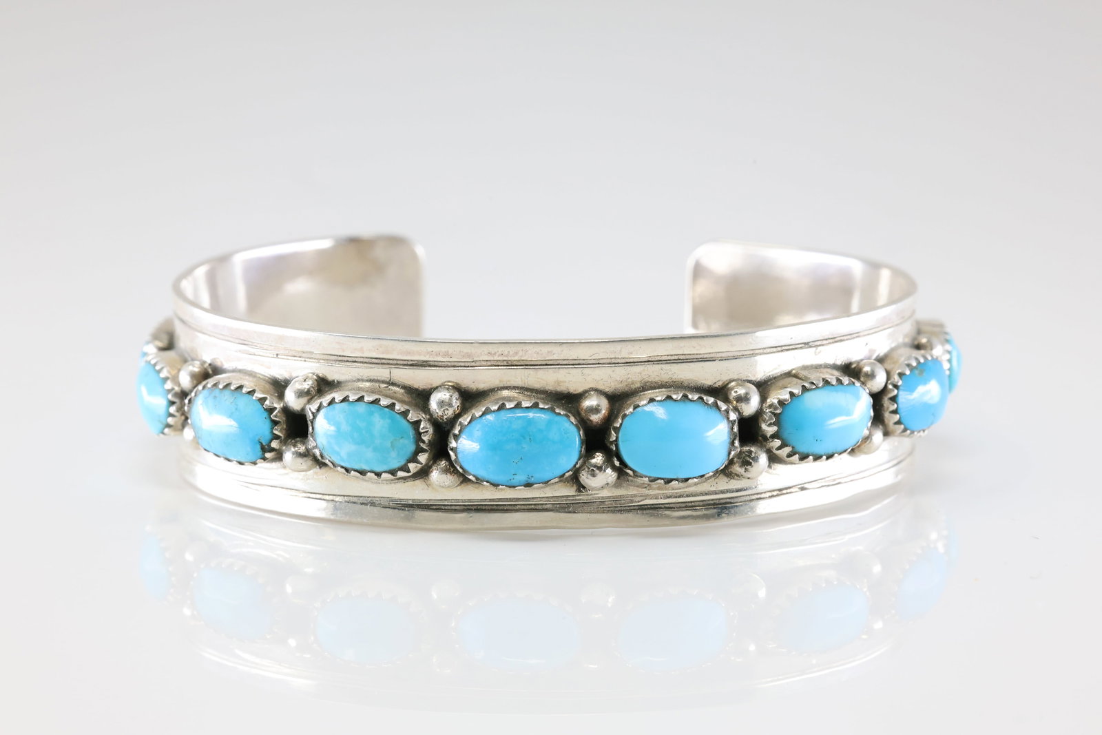 Native American Navajo Sterling Silver Turquoise Bracelet Cuff By E.W.: This is a Native American Navajo Sterling Silver Turquoise Bracelet Cuff By E.W. Stamp E.W.