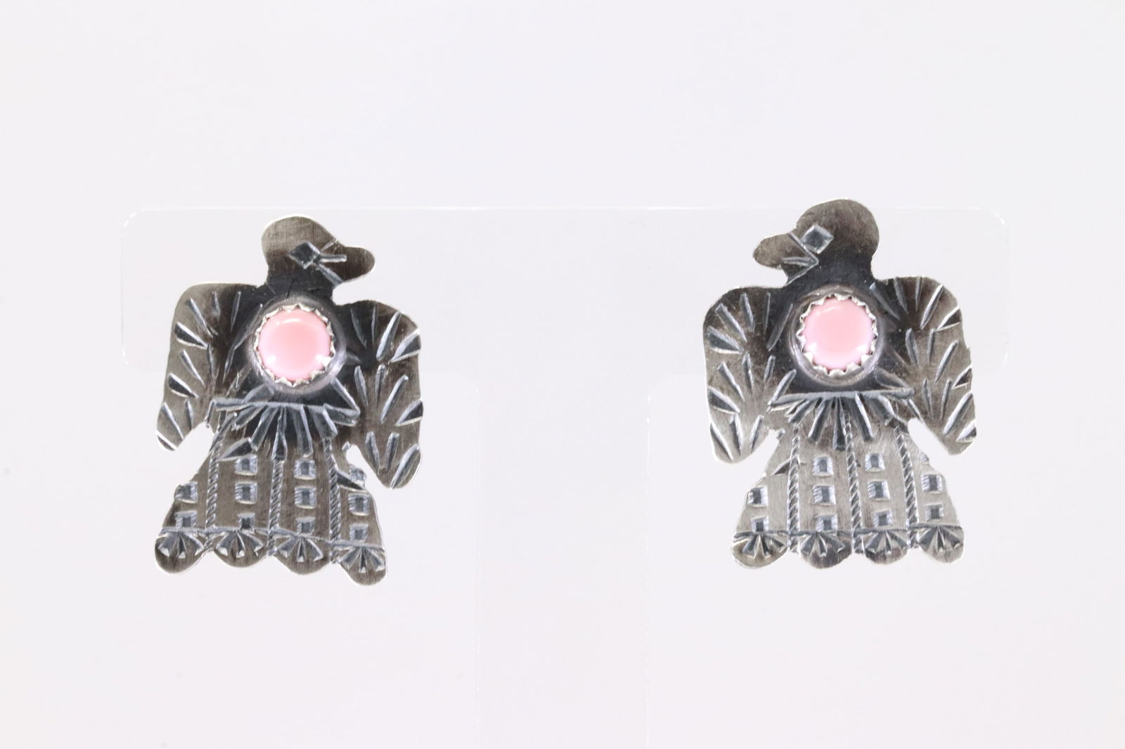 America Sterling Silver Pink Conch Shell Thunderbird Post Earring's.: This is a America Sterling Silver Pink Conch Shell Thunderbird Post Earring's.