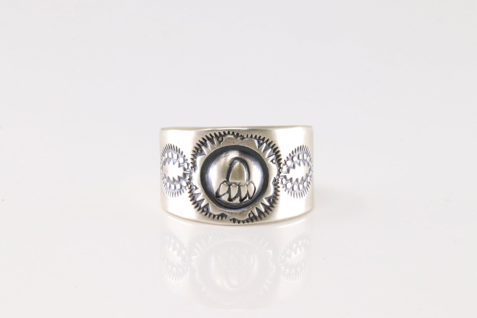 Native America Navajo Sterling Silver Solid Stamped Ring By M.C.: This is a Native America Navajo Sterling Silver Solid Stamped Ring By M.C. Ring size: 10.00.