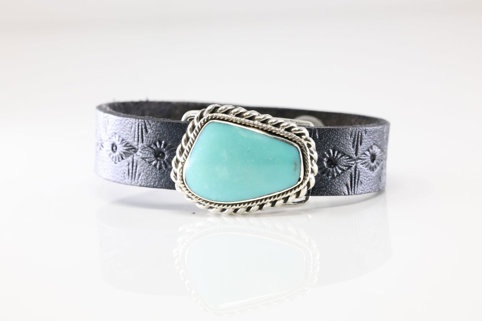 America Sterling Silver Turquoise Leather Bracelet.: This is a America Sterling Silver Turquoise Leather Bracelet. Bracelet length: 8.50"