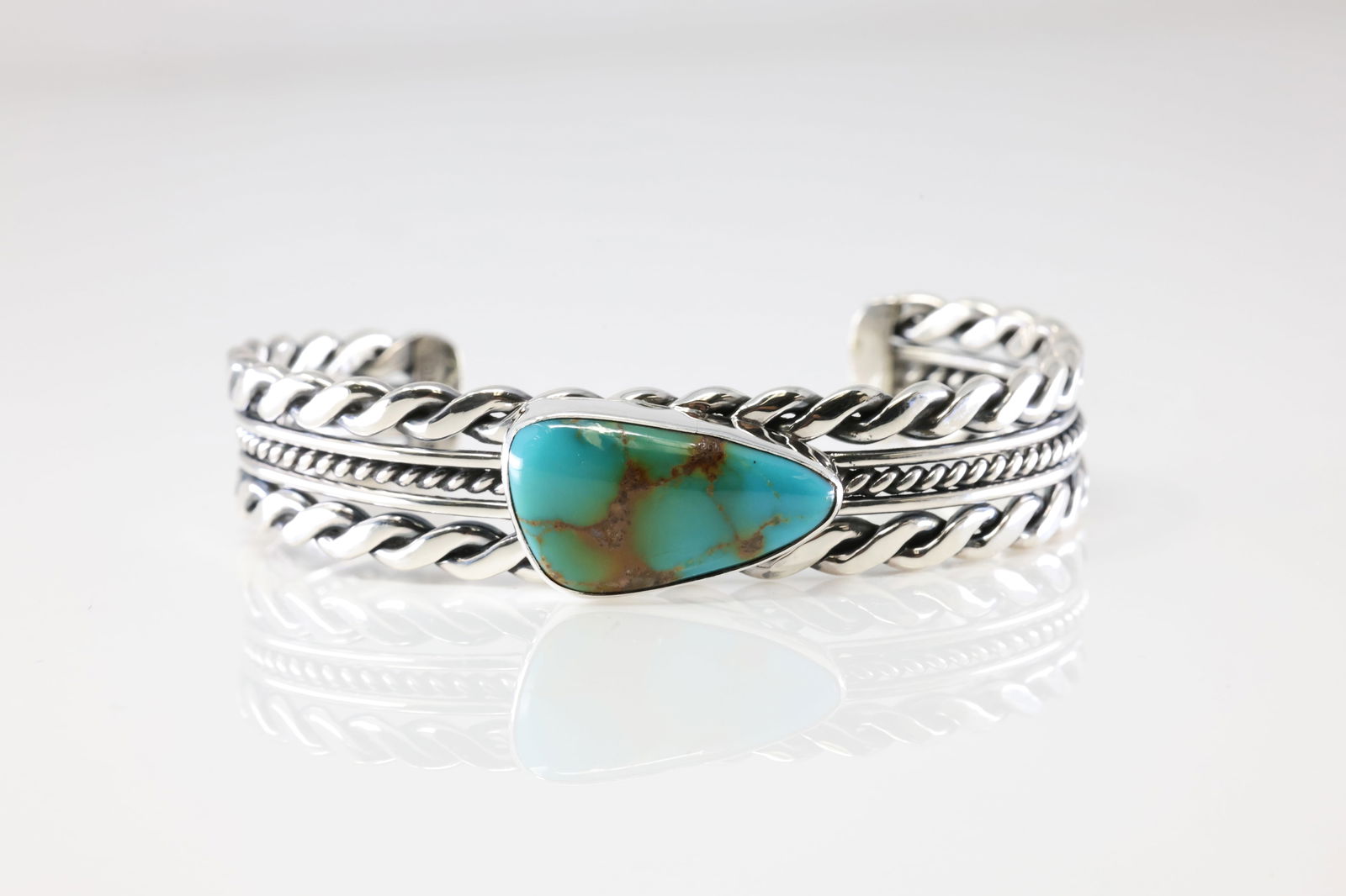 Native America Navajo Sterling Silver Turquoise Bracelet Cuff By Roy Tom.: This is a Native America Navajo Sterling Silver Turquoise Bracelet Cuff By Roy Tom. Stamp R.Tom.
