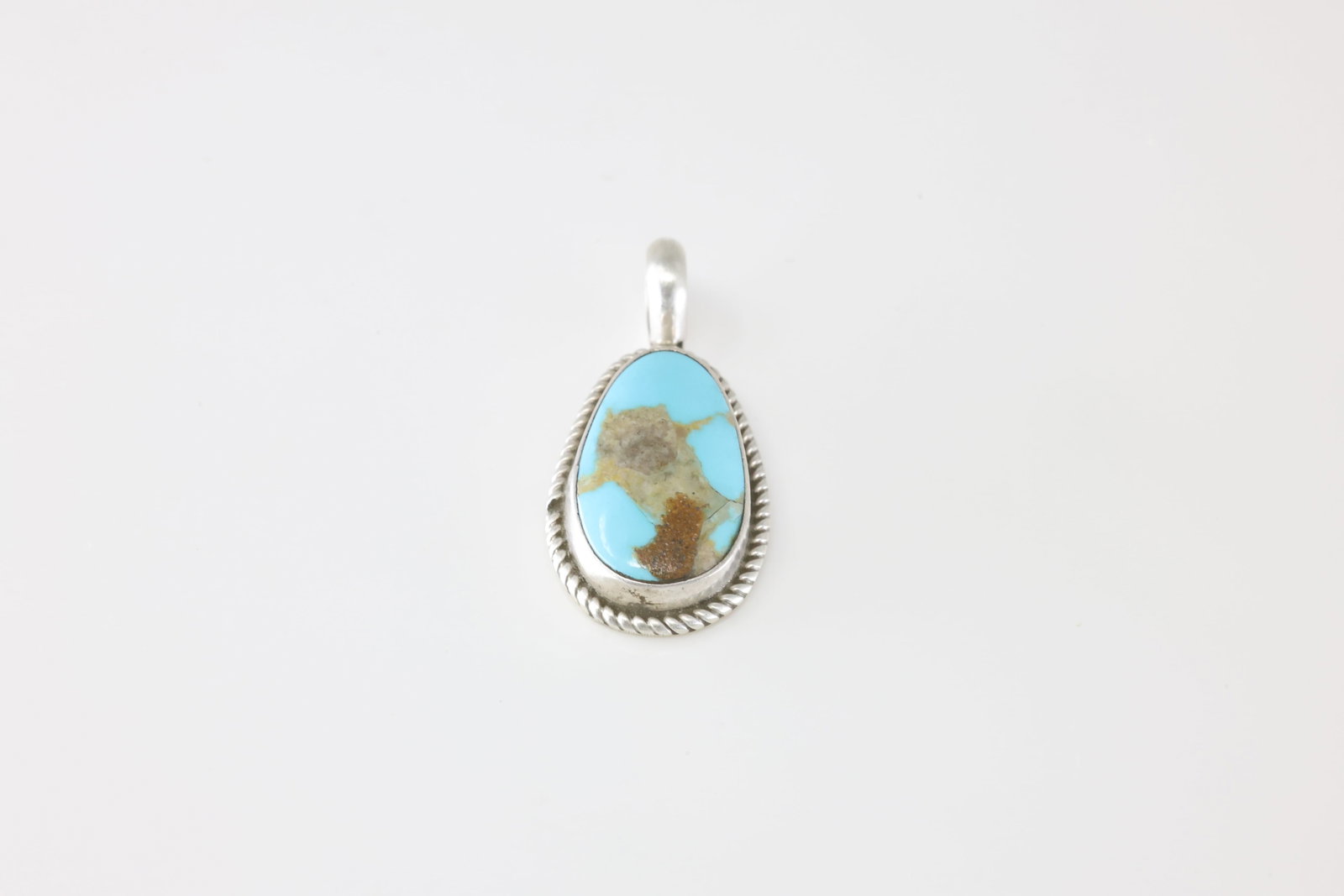 Native America Navajo Sterling Silver Kingman Turquoise Pendent By Marcella James.: This is a Native America Navajo Sterling Silver Kingman Turquoise Pendent By Marcella James. Stamp Marcella James.