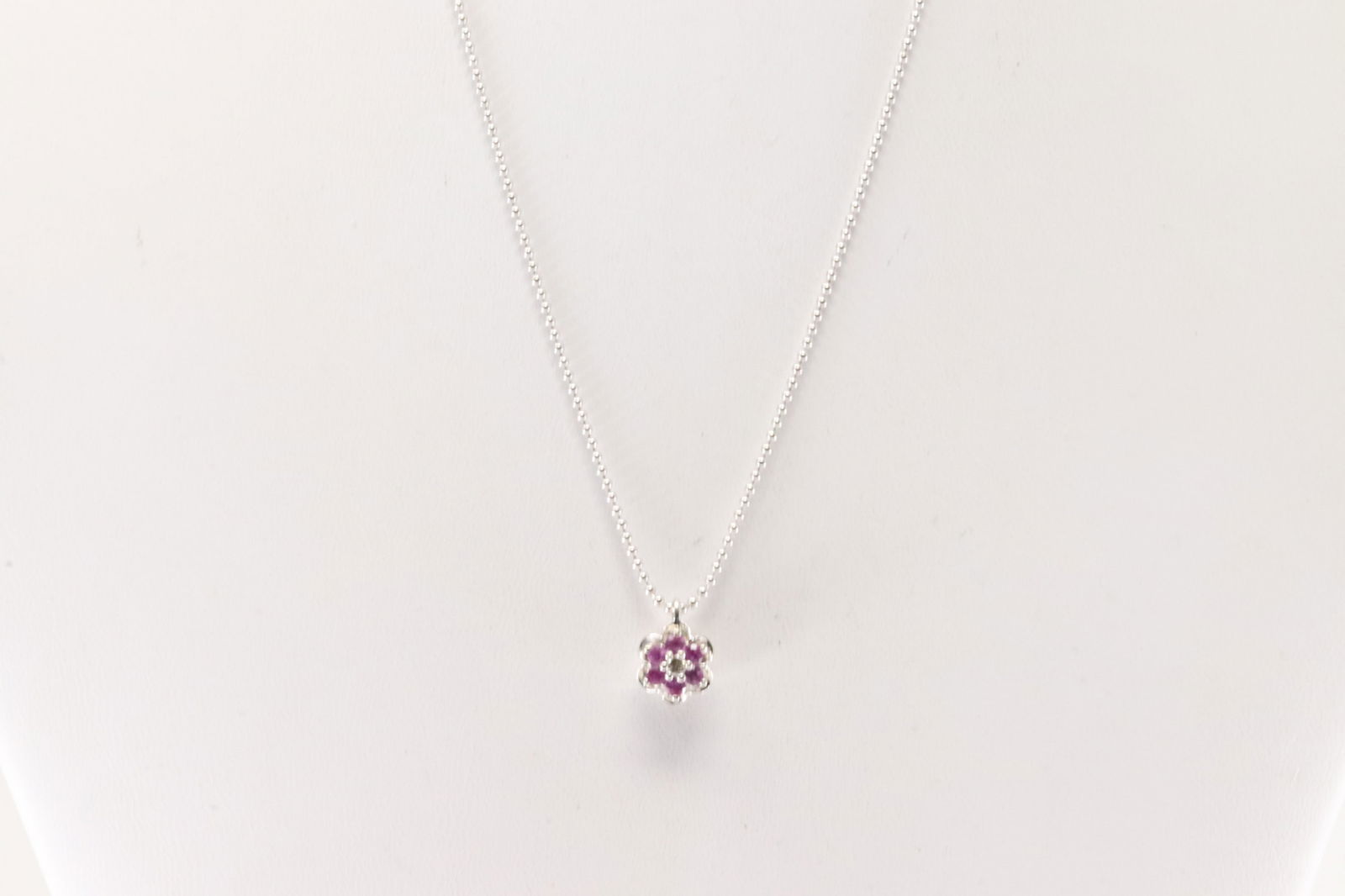 Ruby & Diamond Pendant / Necklace 14Kt.: Ladies 14Kt White Gold Ruby & Diamond Pendant / Necklace. This charming pendant has pink rubies with round diamonds and a 14k white necklace. Neckalce length: 16.00" 3.60 Grams.