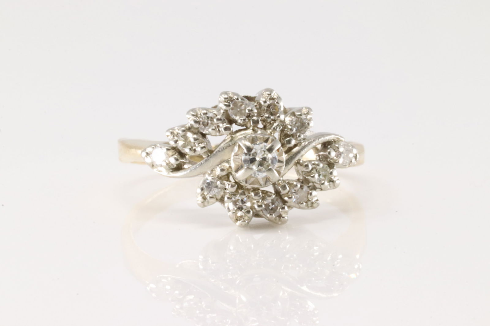 Diamond Ring 14Kt.: Ladies 14Kt Yellow Gold Diamond Ring. This stunning ring has 13 saprkling round diamonds. Diamonds weight approx: 0.45 ctw Ring size: 8.50. Total weight: 3.60 Grams.