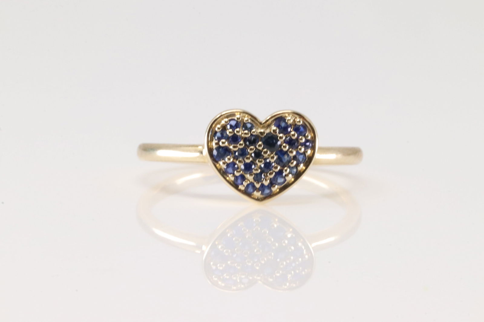 Heart Sapphire Ring 10Kt.: Ladies 10Kt Yellow Gold Sapphire Heart Ring. This is Ring has Heart Shaped with Blue Sapphires. Ring size: 7.00.