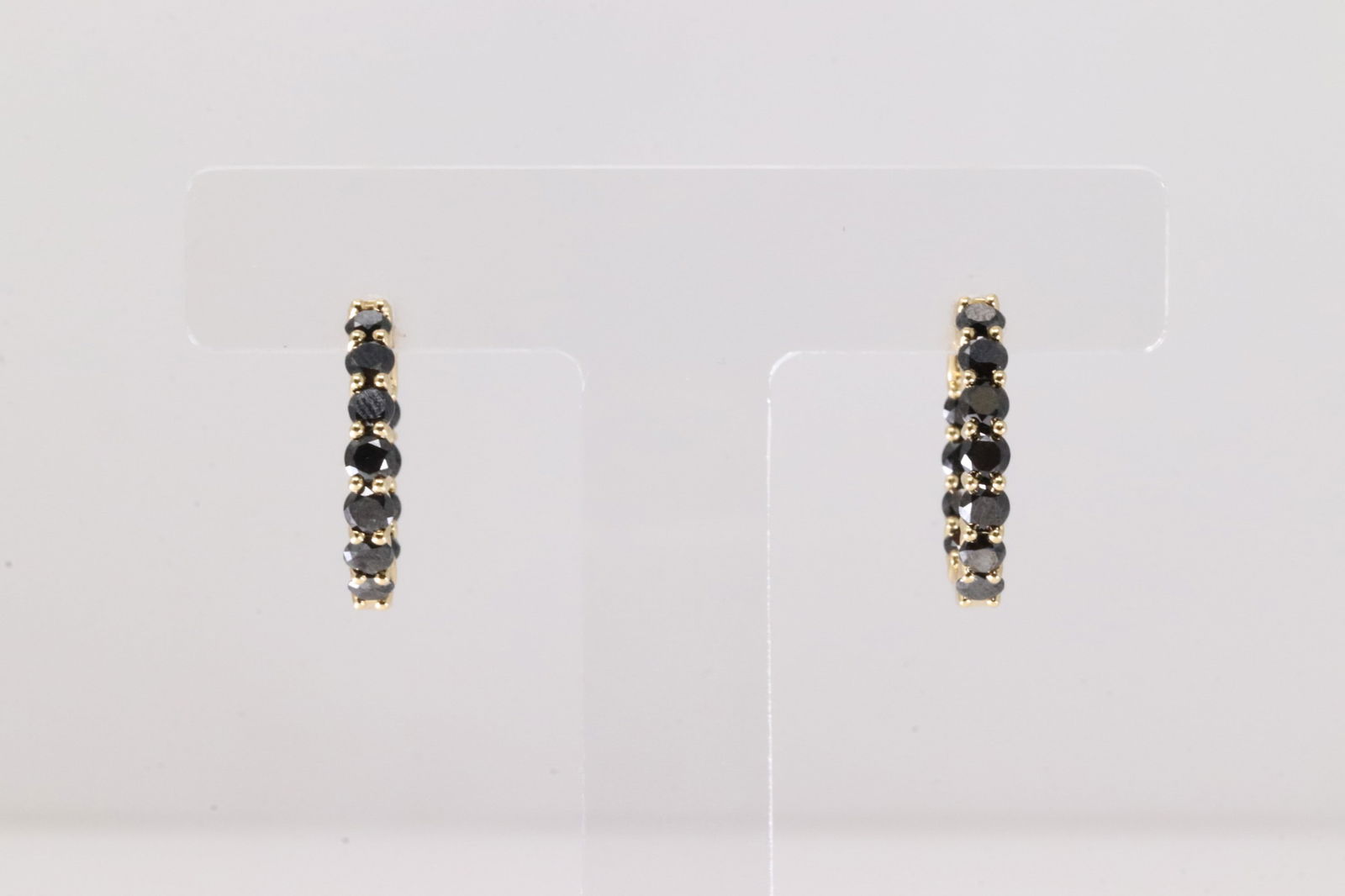 Sapphire Hoop Earring 18Kt.: Ladies 18Kt Yellow Gold Sapphire Hoop Earring. This Charming Earring's has In & Out Sapphire Gemstones. Total Weight: 5.00 Grams.