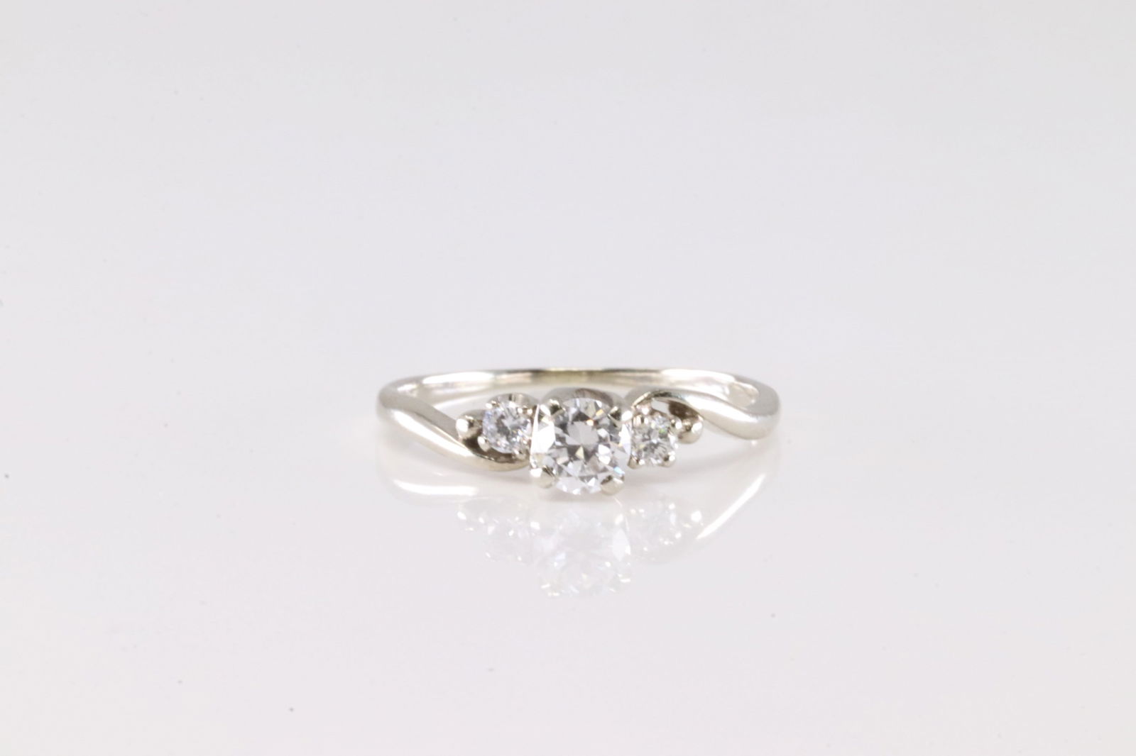 Diamond Ring 18Kt.: Ladies 18Kt White Gold Diamond Ring. This Goegeous Ring has 3 Round Brilliant Diamonds. Ring Size: 5.75.