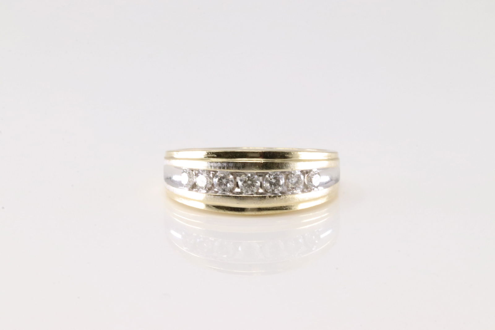 Wedding Diamond Ring 14Kt.: 14Kt Yellow Gold Wedding Diamond Ring. This Elegant Ring has one row with 7 Sparkling Diamonds. Diamonds weight approx: 0.50ctw. Ring size: 8.75. Total weight: 4.10 Grams.