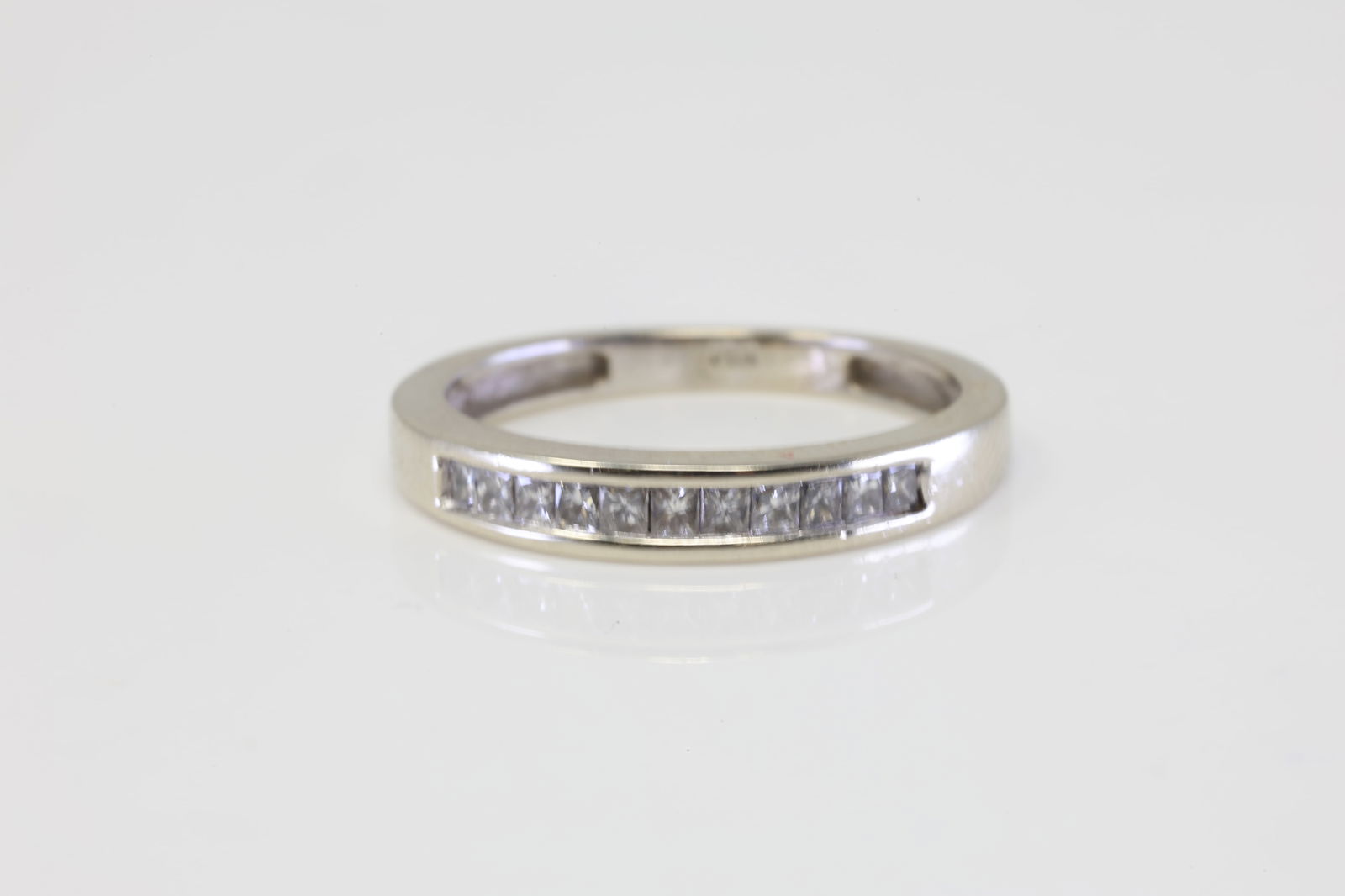 Diamond Ring 14Kt.: 14Kt White Gold Diamond Ring. Ring has 11 Diamonds. Diamonds weight approx: 0.42ctw. Ring size: 6.75. Total weight: 2.80 Grams.