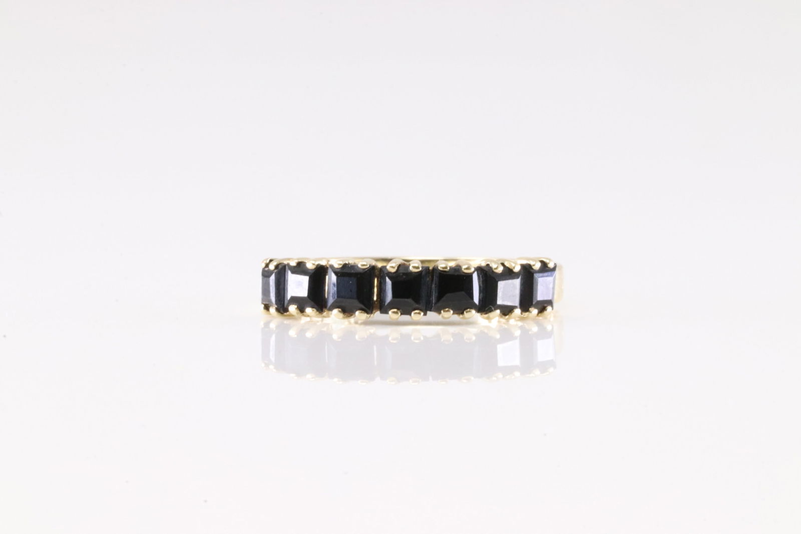 Black Onyx Ring 10Kt.: Ladies 10Kt Yellow Gold Black Onyx Ring. This Elegant Ring has Black Onyx Square Gemstones. Ring Size: 6.75.